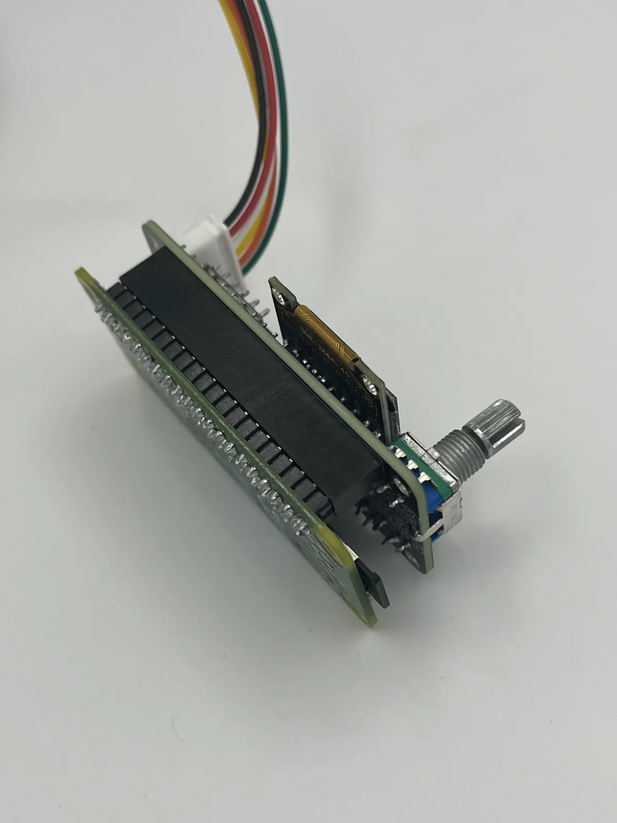 Pi1541 HAT attached to a Raspberry Pi header adapter with OLED display and rotary encoder
