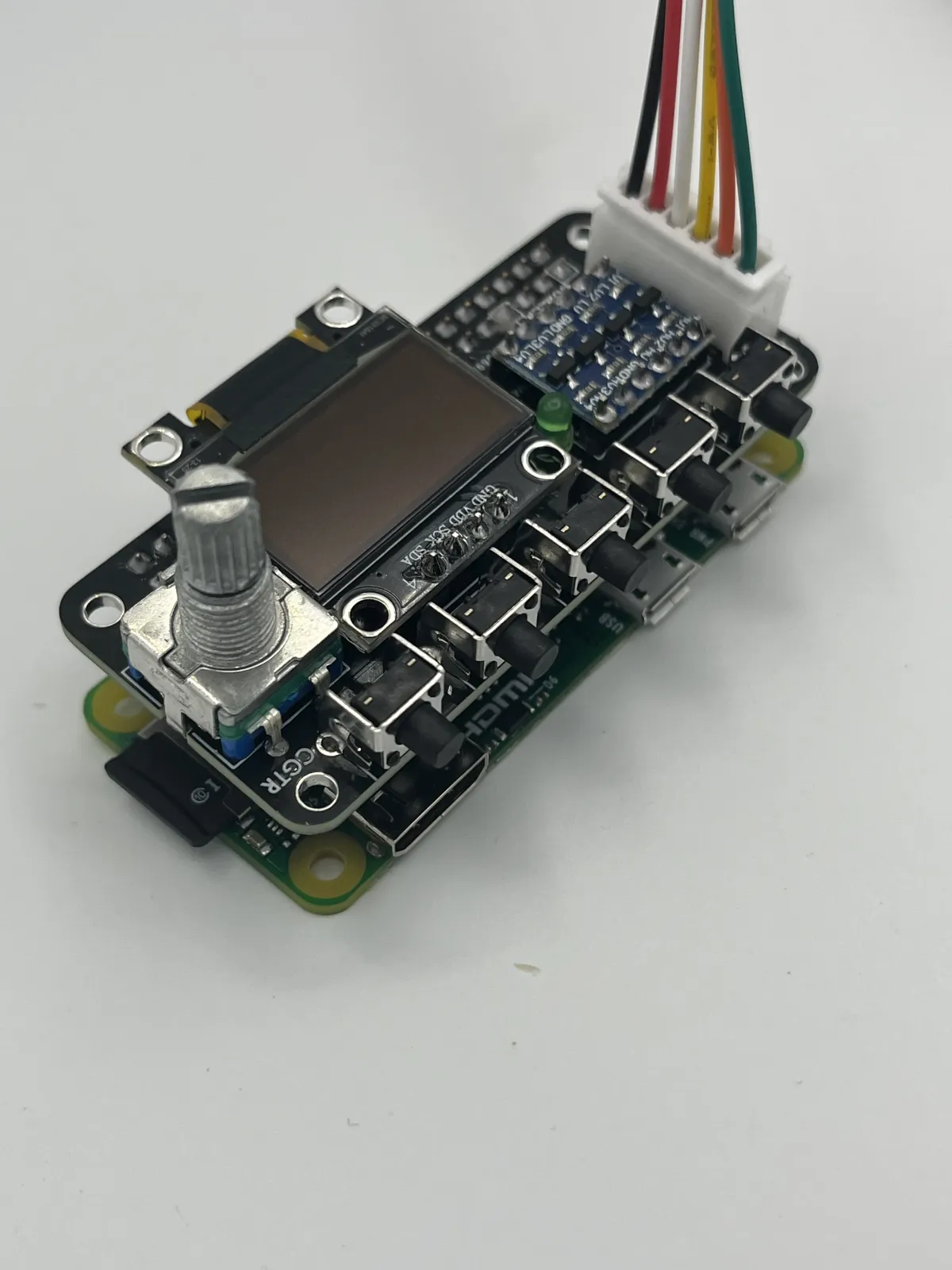 Pi1541 HAT mounted to a Raspberry Pi Zero with OLED display and rotary encoder